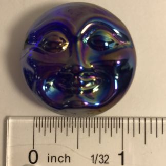 Blue irridized glass moon face