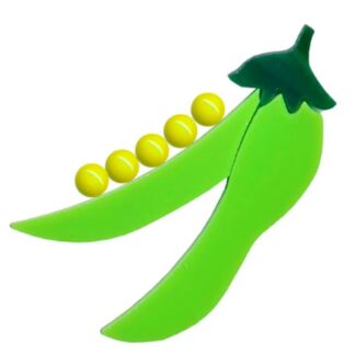Green plastic pea pod toy with yellow peas inside on a white background.